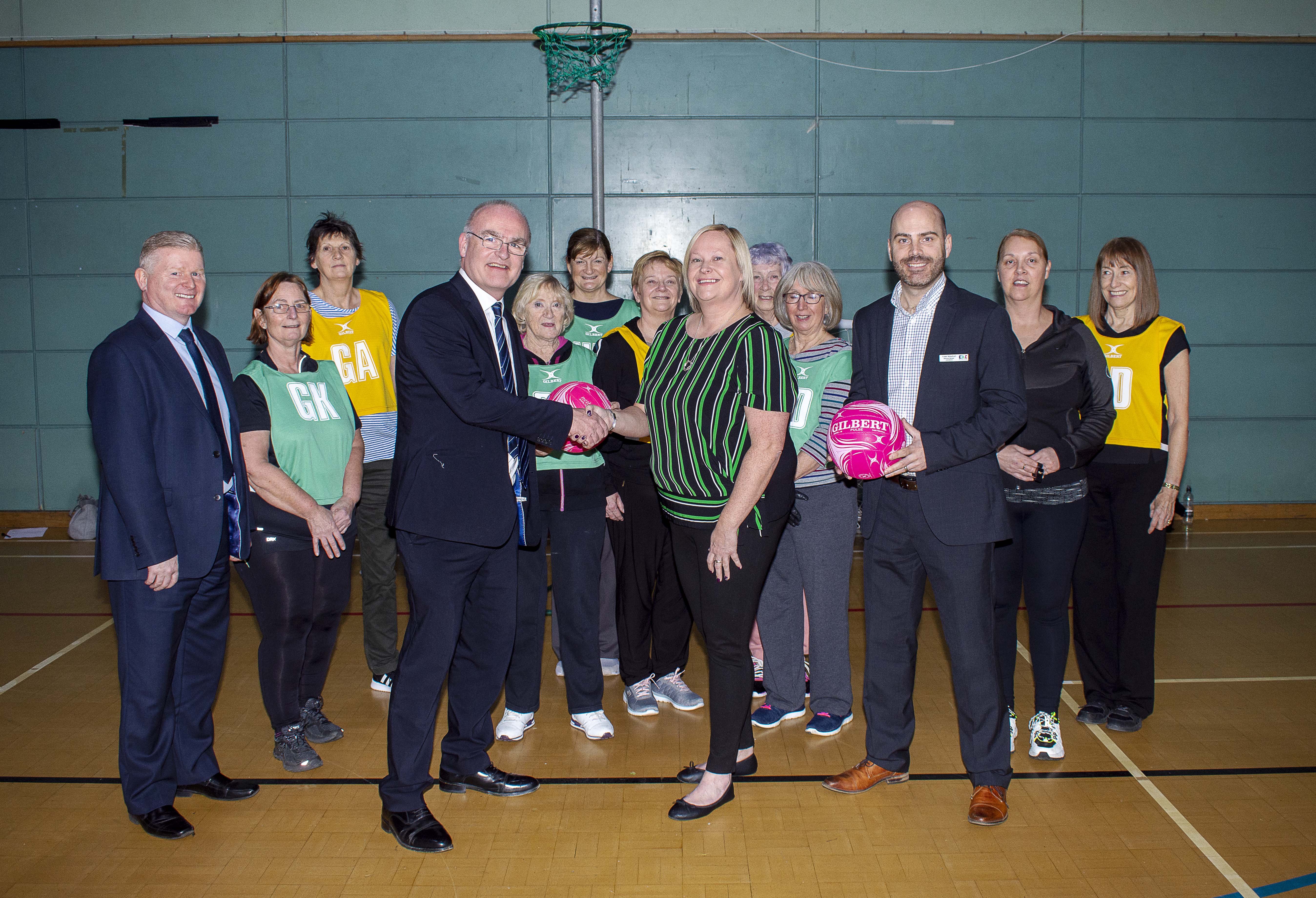 image of councillors, netball team and coach