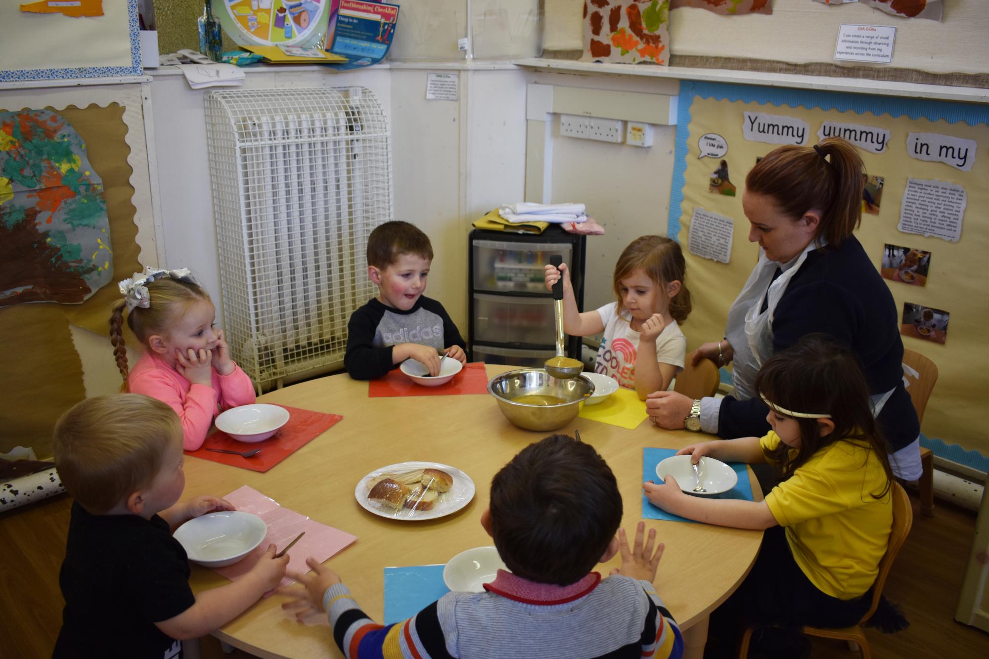 children making food round table