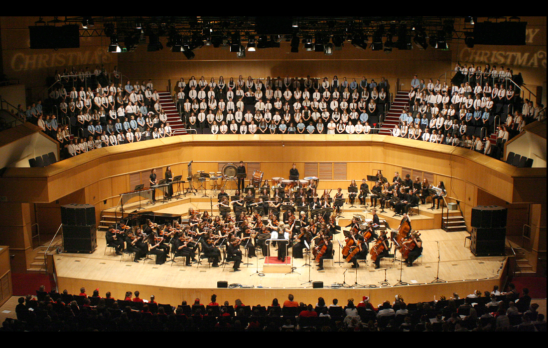School orchestra performing at the concert hall