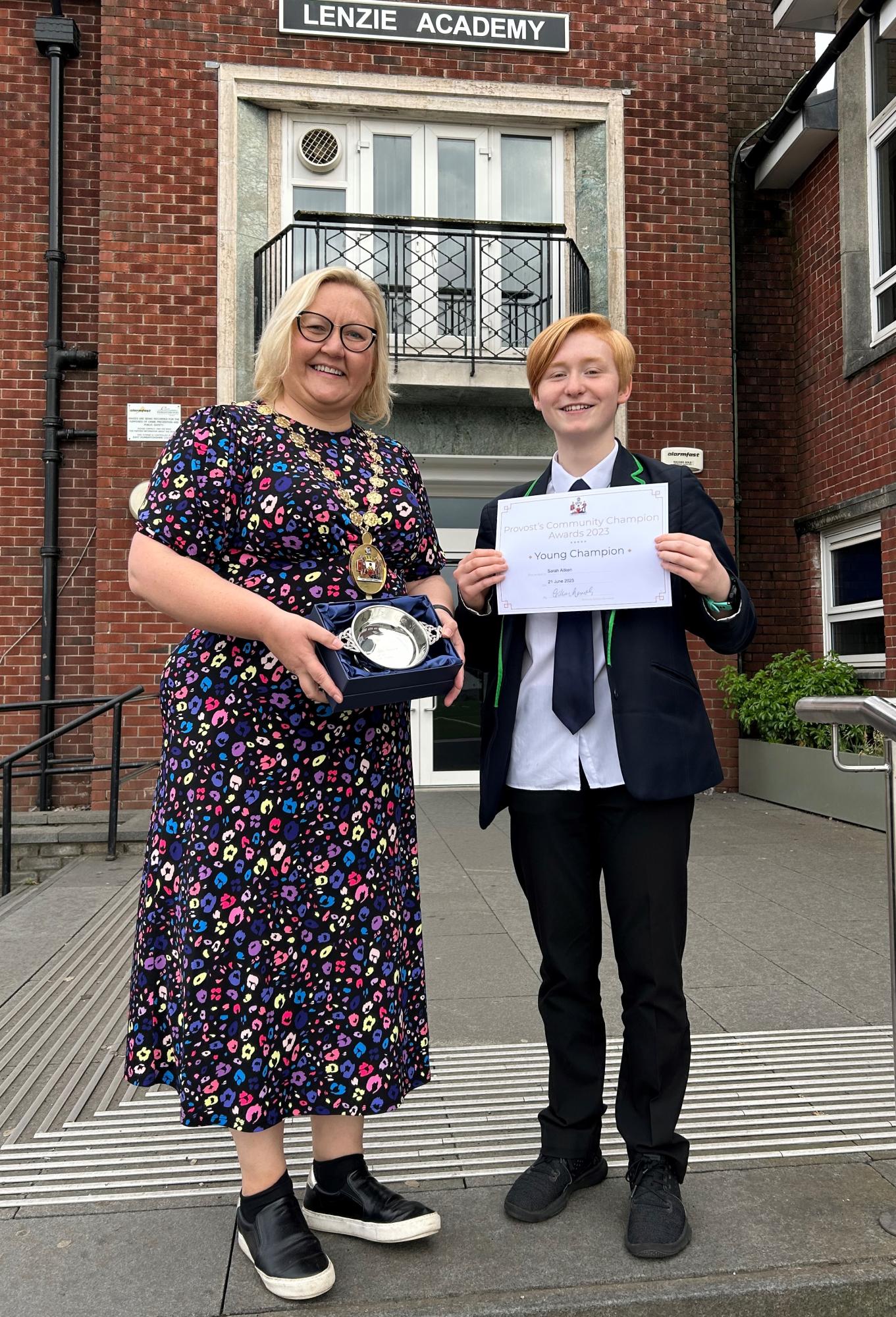 Provost Gillian Renwick with pupil Sarah Aitken holding the Young Champion award