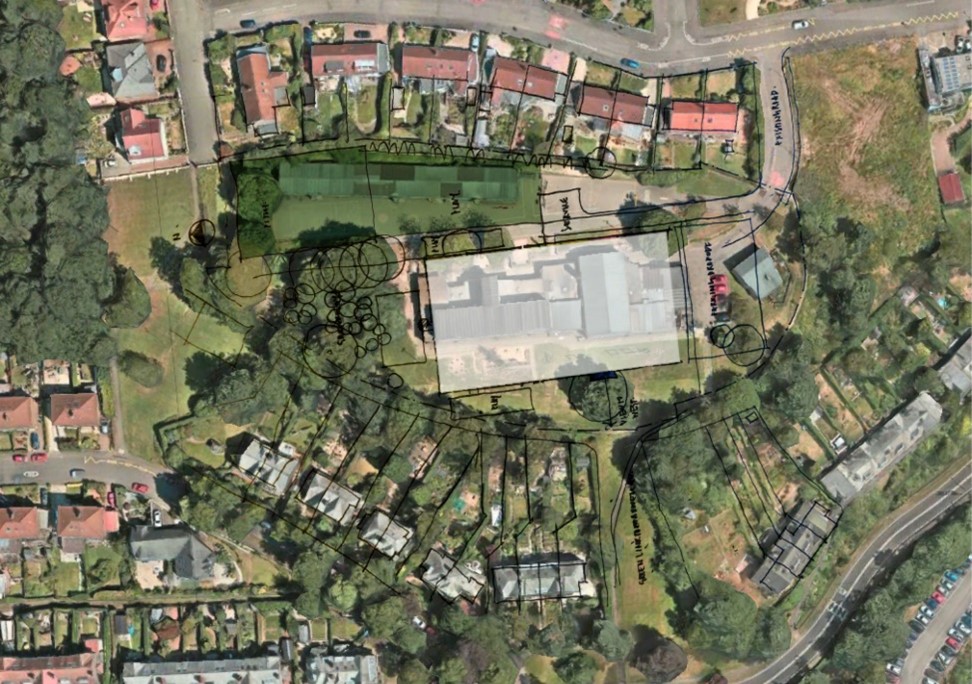 Site plan of existing school site with indicative new school zoning in the optimum new location overlayed on top of the existing building footprint.