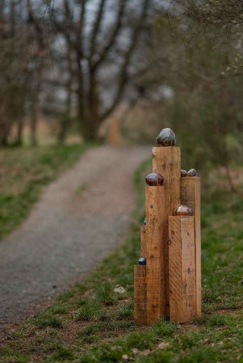 wooden posts at the side of a footpath