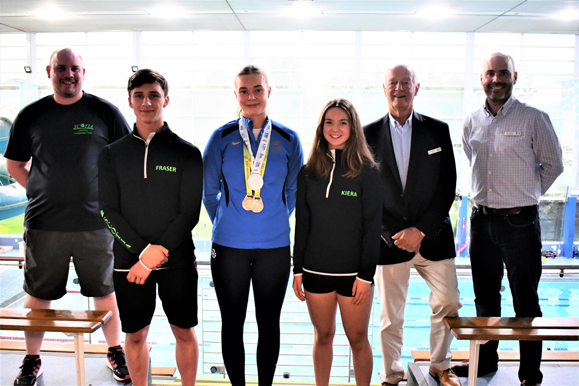 •	Pictured (from left) are: Scotia Head Coach Jonny Sprot; Scotia Club Captain Fraser Baird; Katie; Scotia Club Captain Kiera Hart; Jim Neill, Chair of EDLC Trust; and Fraser Makeham, Operations Manager - Leisuredrome.