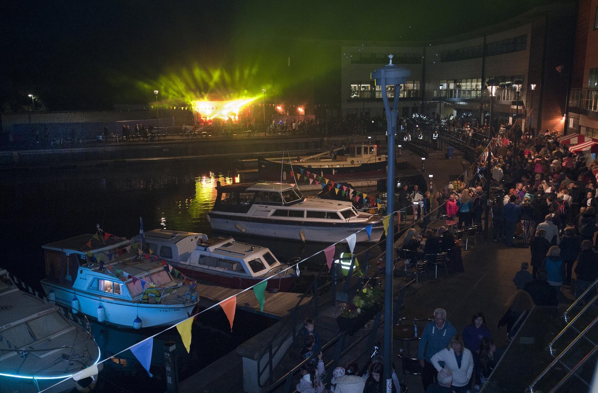 Image from Kirkintilloch Canal Festival - Marina with boats and stage at night