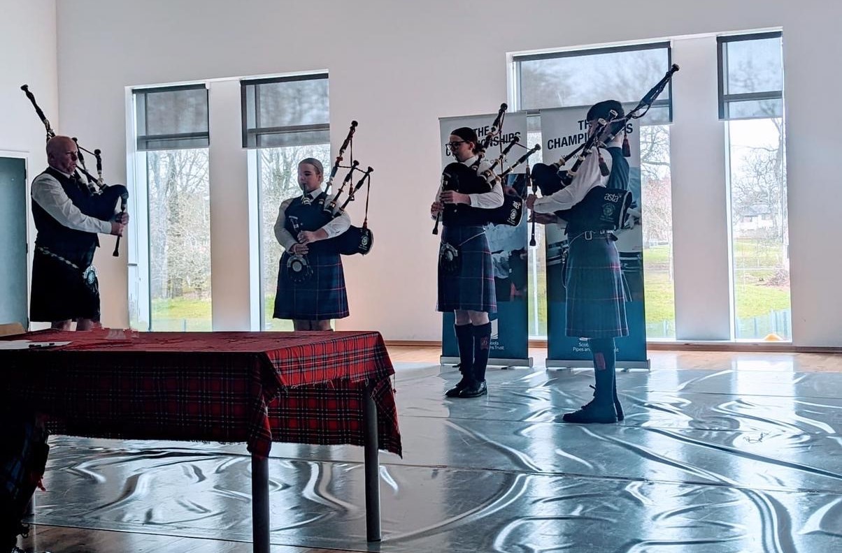 Pipers playing bagpipes