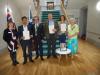 Provost Alan Brown presented these new citizens with their Certificates of Naturalisation.