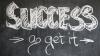 image of blackboard with success go get it wrote