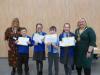 Cllr Williamson (left) and Provost Renwick with the winning team from Millersneuk Primary.