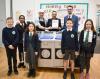 Cllr Paul Ferretti at Lenzie Academy with pupils and staff receiving award from Sarah Duley from Food For Life Scotland